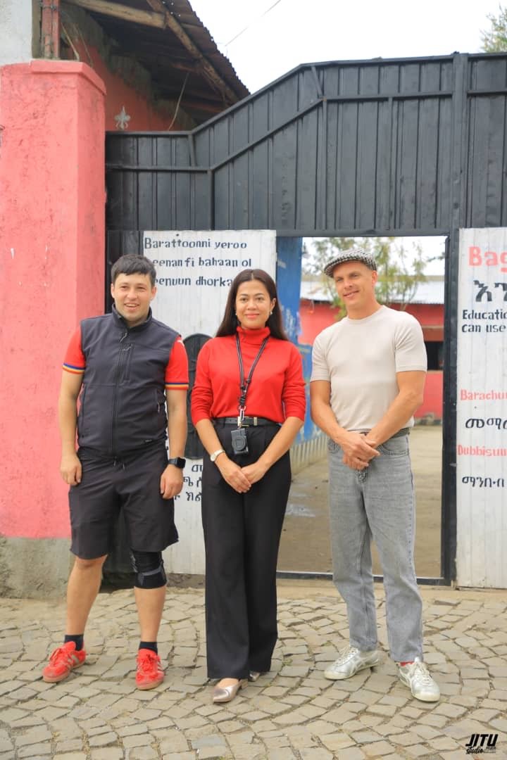 The team arrives at a partner school