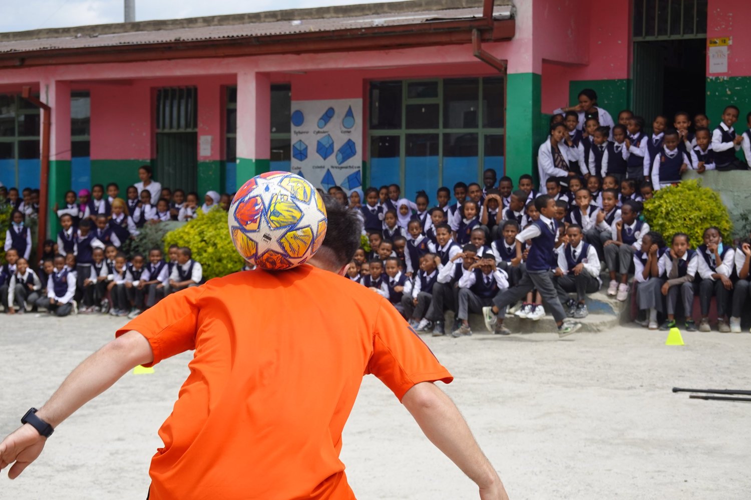 Football skills in a colourful courtyard